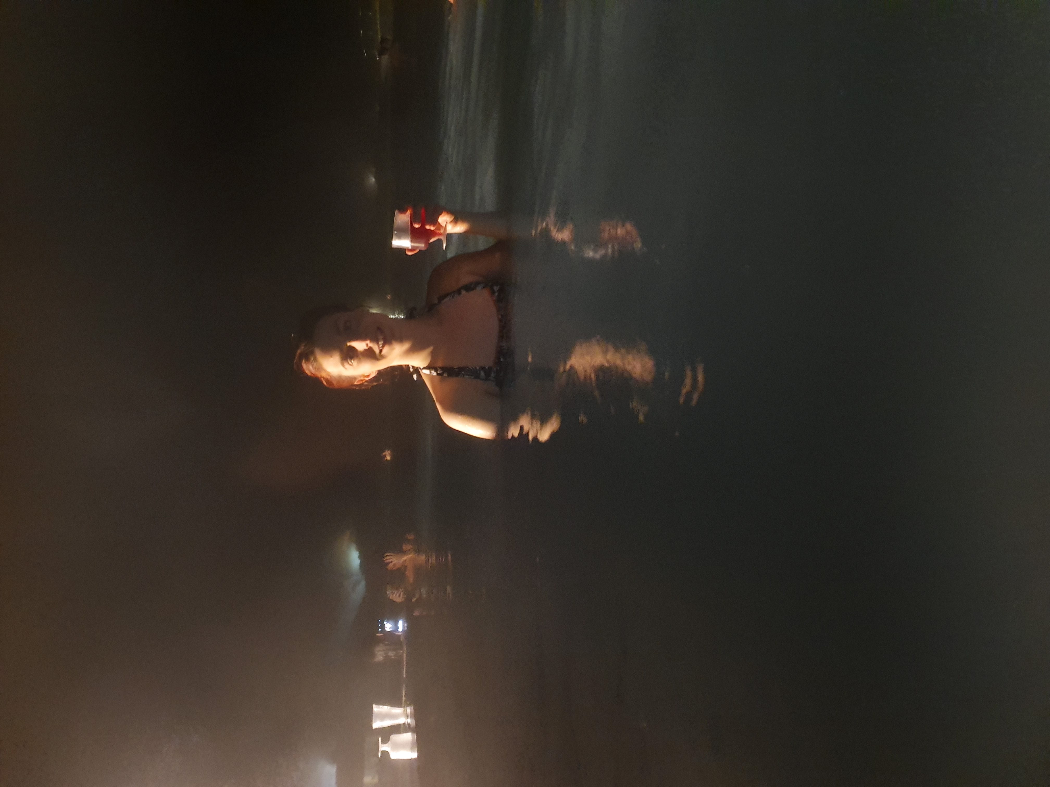 picture of me with a glass of wine in the blue lagoon water